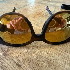 Oakley Women's Sunglasses - Black Frame with Gold Lenses